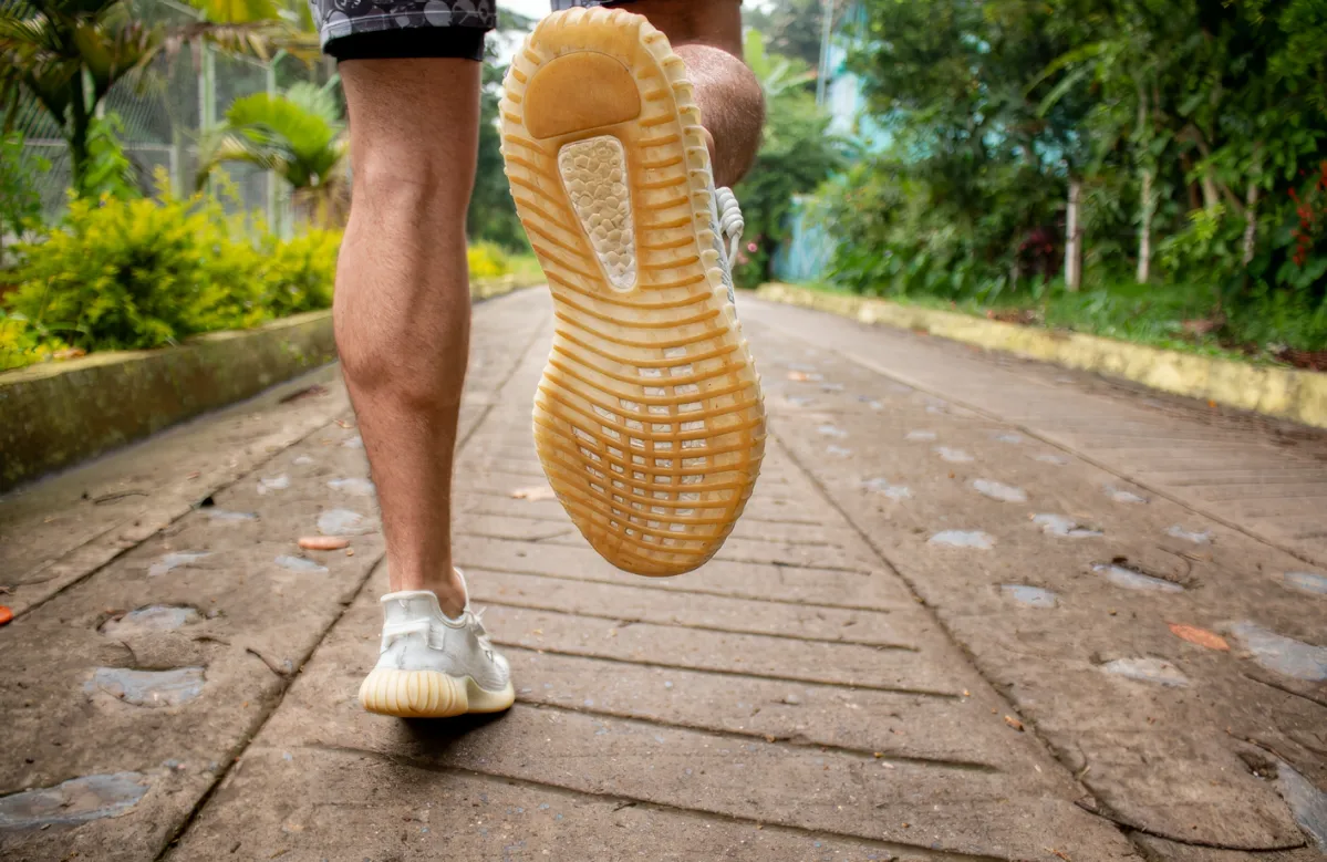 close up of a man s legs jogging or running in sne utc