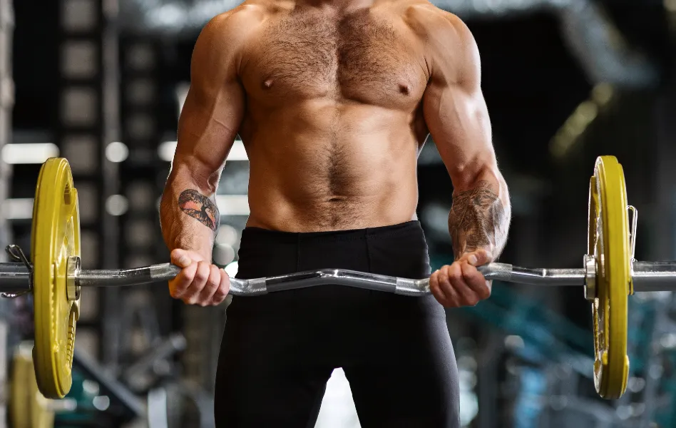 concentrated powerlifter training with heavy barbe utc