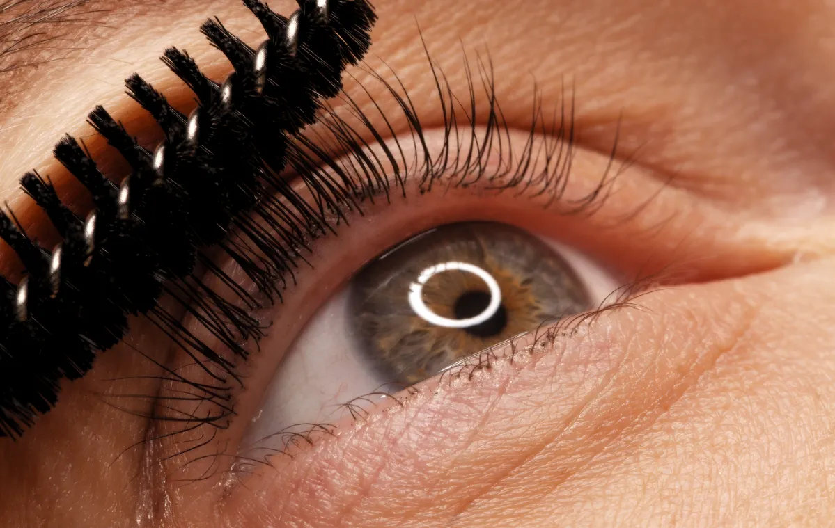 making makeup in a beauty salon applying black ma utc