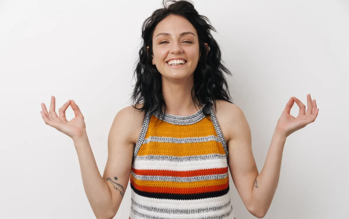 smiling positive woman meditating isolated utc